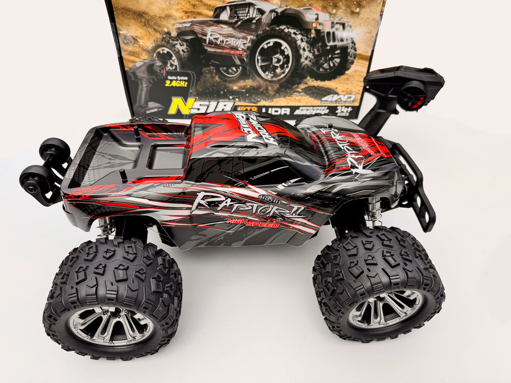 Toy monster truck with large wheels on a white background